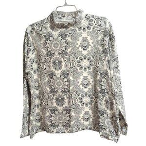 Tabi Turtleneck Top in White with a Black Floral Print, featuring long sleeves a